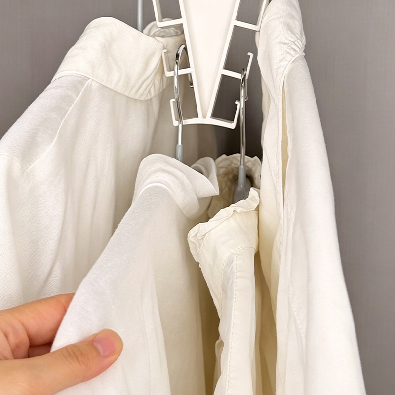 👕Multifunctional Triangle Closet Organizer